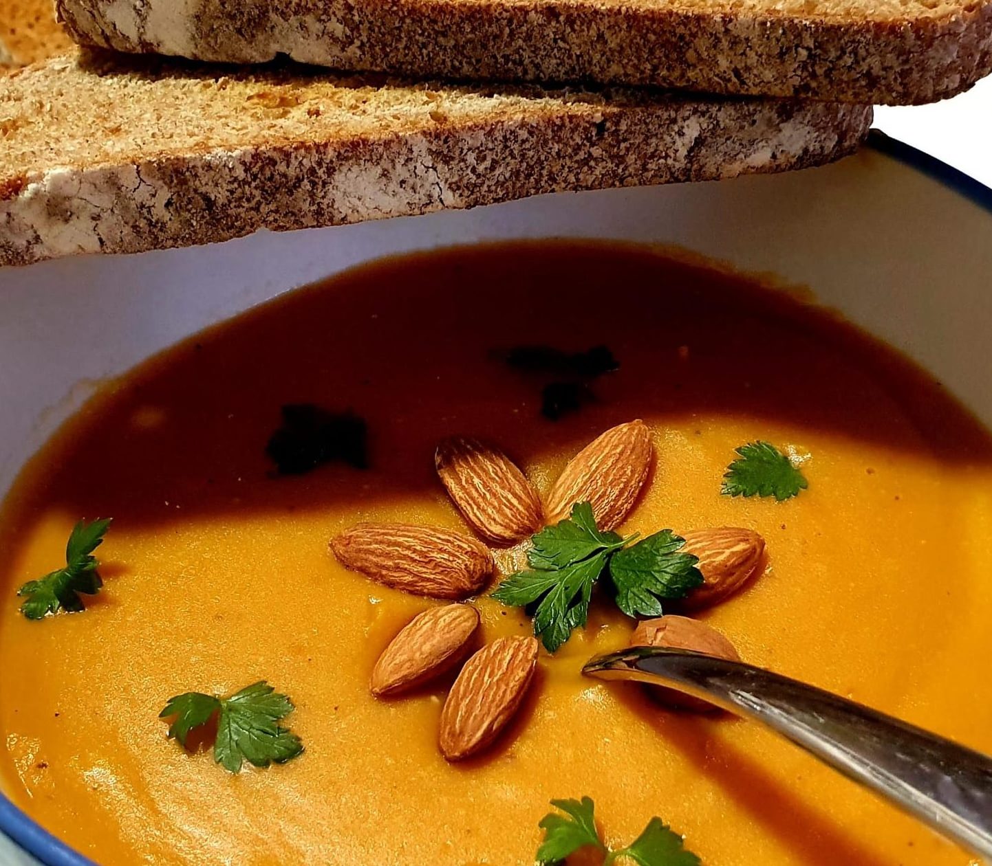 Indulge in the comforting embrace of Klara's Red Lentils Cream Soup. A nourishing bowl awaits!